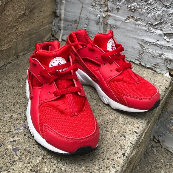 red huaraches with white bottoms